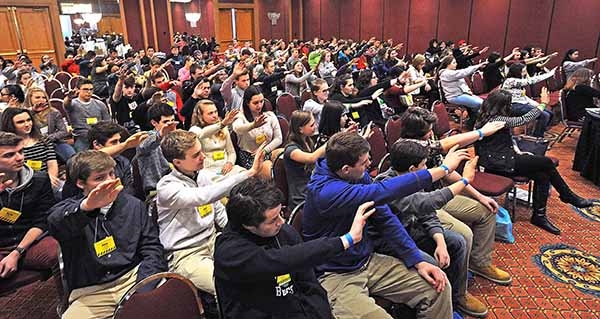 Students begin a break out session by praising the Lord at the Adams Mark Hotel during day two of the 65th Annual Diocese of Buffalo Youth Convention. (Dan Cappellazzo/Staff Photographer)
